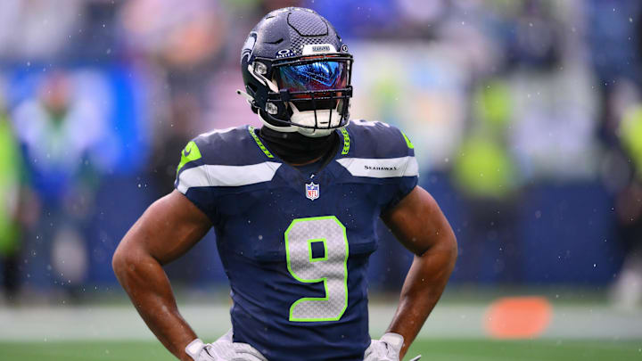 Dec 22, 2024; Seattle, Washington, USA; Seattle Seahawks running back Kenneth Walker III (9) during warmups before the game against the Minnesota Vikings at Lumen Field. Mandatory Credit: Steven Bisig-Imagn Images
