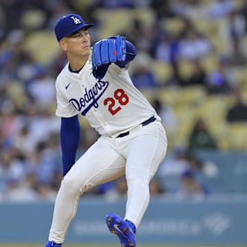 Apr 16, 2025; Los Angeles, California, USA;  Los Angeles Dodgers pitcher Bobby Miller (28) pitches in the first inning against the Colorado Rockies at Dodger Stadium. Mandatory Credit: Jayne Kamin-Oncea-Imagn Images