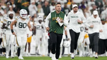 Sep 11, 2025; Green Bay, Wisconsin, USA; Green Bay Packers head coach Matt LaFleur leaves the field at halftime against the Washington Commanders at Lambeau Field. Mandatory Credit: Jeff Hanisch-Imagn Images