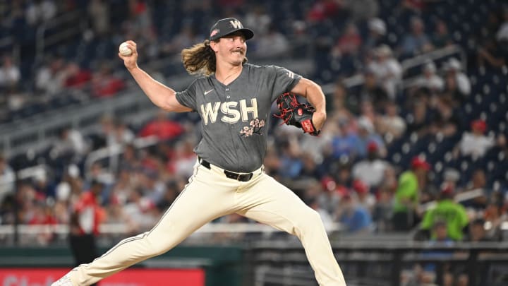 Jul 5, 2024; Washington, District of Columbia, USA; Washington Nationals relief pitcher Hunter Harvey (73) throws a pitch against the St. Louis Cardinals during the seventh inning at Nationals Park. Mandatory Credit: Rafael Suanes-USA TODAY Sports