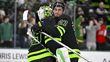 Dec 16, 2024; Dallas, Texas, USA; Dallas Stars goaltender Jake Oettinger (29) and left wing Mason Marchment (27) celebrate on the ice after the Stars defeat the Washington Capitals at the American Airlines Center. Mandatory Credit: Jerome Miron-Imagn Images