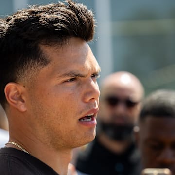 Cleveland Browns quarterback Dillon Gabriel (5) talks to the media during rookie minicamp.