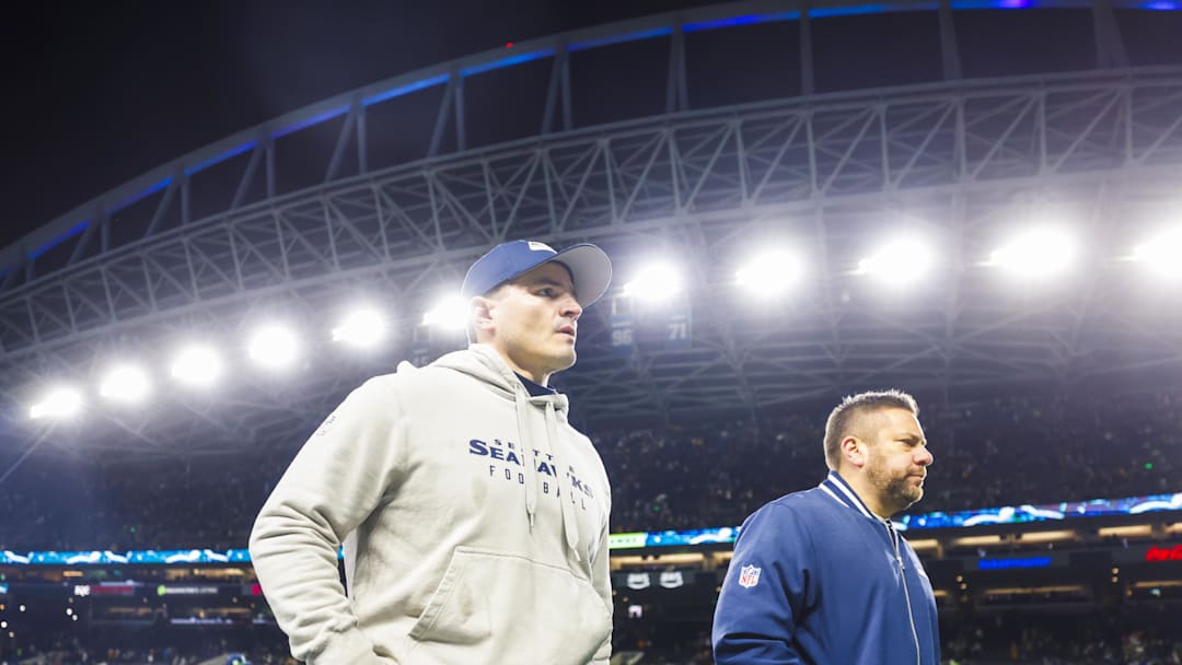 Dec 15, 2024; Seattle, Washington, USA; Seattle Seahawks head coach Mike Macdonald, left, walks to the locker room following a loss against the Green Bay Packers at Lumen Field. Mandatory Credit: Joe Nicholson-Imagn Images Dec 15, 2024; Seattle, Washington, USA; Seattle Seahawks head coach Mike Macdonald, left, walks to the locker room following a loss against the Green Bay Packers at Lumen Field. Mandatory Credit: Joe Nicholson-Imagn Images