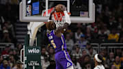 Nov 15, 2025; Milwaukee, Wisconsin, USA;  Los Angeles Lakers center Deandre Ayton (5) dunks during the first quarter against the Milwaukee Bucks at Fiserv Forum. Mandatory Credit: Jeff Hanisch-Imagn Images