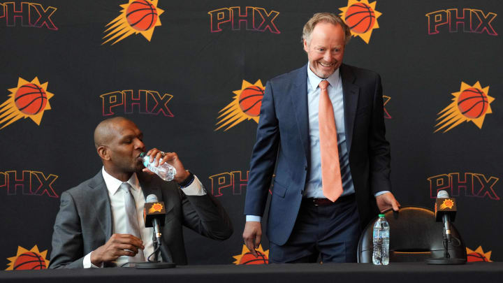 May 17, 2024; Phoenix, AZ, USA; Mike Budenholzer arrives alongside General Manager James Jones during a press conference to announce his job as head coach of the Phoenix Suns. Mandatory Credit: Joe Camporeale-USA TODAY Sports