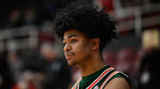 Jan 22, 2025; Stanford, California, USA; Miami (FL) Hurricanes guard Austin Swartz (23) looks on during warm ups before their game against the Stanford Cardinal at Maples Pavilion. Mandatory Credit: Eakin Howard-Imagn Images