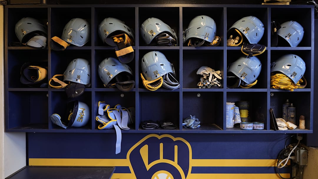 May 31, 2024; Milwaukee, Wisconsin, USA;  General view of Milwaukee Brewers batting helmets in the dugout prior to the game against the Chicago White Sox at American Family Field. Mandatory Credit: Jeff Hanisch-Imagn Images