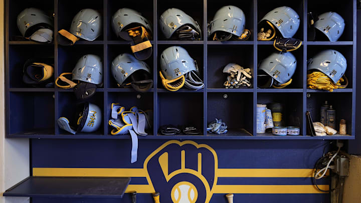 May 31, 2024; Milwaukee, Wisconsin, USA;  General view of Milwaukee Brewers batting helmets in the dugout prior to the game against the Chicago White Sox at American Family Field. Mandatory Credit: Jeff Hanisch-Imagn Images