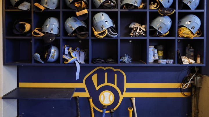 May 31, 2024; Milwaukee, Wisconsin, USA;  General view of Milwaukee Brewers batting helmets in the dugout prior to the game against the Chicago White Sox at American Family Field. Mandatory Credit: Jeff Hanisch-USA TODAY Sports