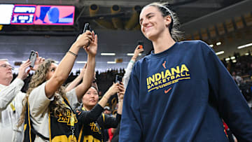 May 4, 2025; Iowa City, IA, USA; Indiana Fever guard Caitlin Clark (22) walks onto the court before the game against the Brazil National Team at Carver-Hawkeye Arena. Mandatory Credit: Jeffrey Becker-Imagn Images