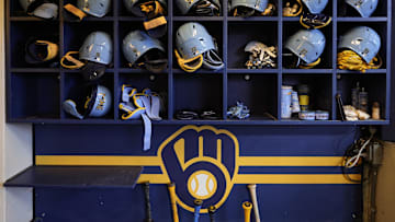 May 31, 2024; Milwaukee, Wisconsin, USA;  General view of Milwaukee Brewers batting helmets in the dugout prior to the game against the Chicago White Sox at American Family Field. Mandatory Credit: Jeff Hanisch-Imagn Images