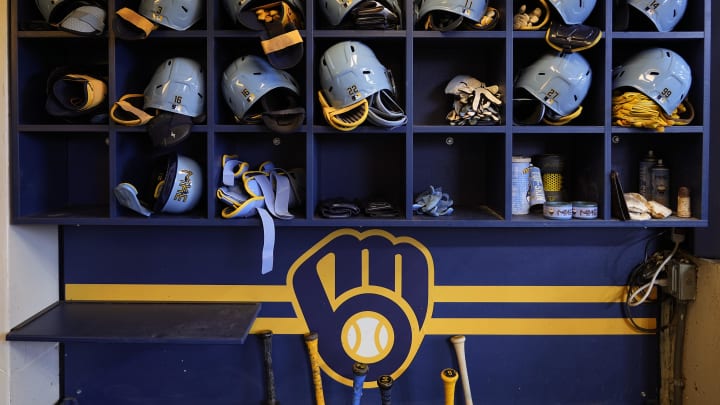 May 31, 2024; Milwaukee, Wisconsin, USA;  General view of Milwaukee Brewers batting helmets in the dugout prior to the game against the Chicago White Sox at American Family Field. Mandatory Credit: Jeff Hanisch-USA TODAY Sports