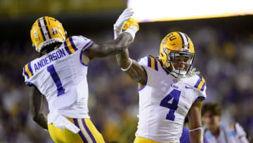 Oct 14, 2023; Baton Rouge, Louisiana, USA; LSU Tigers running back John Emery Jr. (4) celebrates his touchdown with wide receiver Aaron Anderson (1) against the Auburn Tigers during the first quarter during the first quarter at Tiger Stadium. Mandatory Credit: Matthew Hinton-USA TODAY Sports