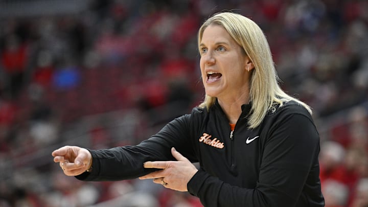 Jan 4, 2026; Louisville, Kentucky, USA;  Virginia Tech Hokies head coach Megan Duffy calls out instructions during the first half agains the Louisville Cardinals at KFC Yum! Center. Mandatory Credit: Jamie Rhodes-Imagn Images