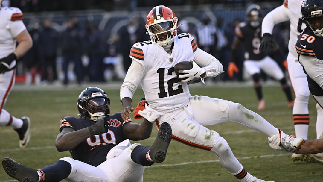 Dec 14, 2025; Chicago, Illinois, USA; Chicago Bears defensive tackle Gervon Dexter Sr. (99) sacks Cleveland Browns quarterback Shedeur Sanders (12) during the fourth quarter at Soldier Field. Mandatory Credit: Matt Marton-Imagn Images
