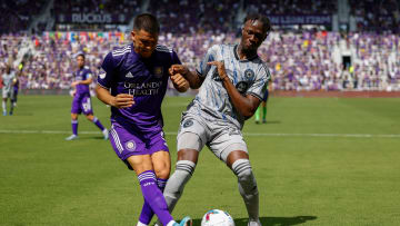 Feb 27, 2022; Orlando, Florida, USA;  CF Montr  al midfielder Isma  l Kon   (28) and Orlando City