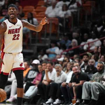 Apr 12, 2024; Miami, Florida, USA;  Miami Heat forward Jimmy Butler (22) calls out a play against the Toronto Raptors during the first half at Kaseya Center. Mandatory Credit: Jim Rassol-USA TODAY Sports