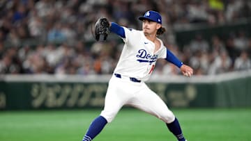 Mar 15, 2025; Bunkyo, Tokyo, Japan; Los Angeles Dodgers starting pitcher Justin Wrobleski (70) throws a pitch against the Yomiuri Giants during the first inning at Tokyo Dome. Mandatory Credit: Darren Yamashita-Imagn Images