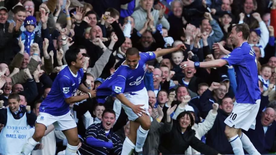 James Vaughan celebrates scoring for Everton with Tim Cahill.