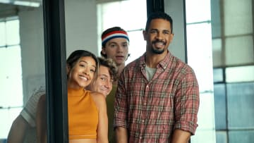 Players. (L-R) Gina Rodriguez as Mack, Augustus Prew as Brannagan, Joel Courtney as Little and Damon Wayans Jr. as Adam in Players. Cr. K.C. Bailey/Netflix ©2023.