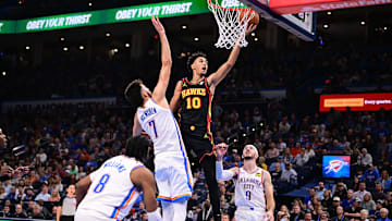 Zaccharie Risacher #10 of the Atlanta Hawks rises for a layup.