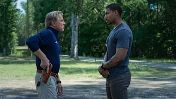 Rebel Ridge. (L-R) Don Johnson as Chief Sandy Burnne and Aaron Pierre as Terry Richmond in Rebel Ridge. Cr. Allyson Riggs/Netflix © 2024.