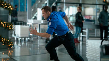 Carry-On. Taron Edgerton as Ethan Kopek in Carry-On.