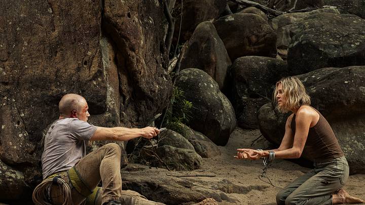(L-R) Taron Egerton as Ben and Charlize Theron as Sasha in Apex