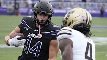 Northwestern Wildcats tight end Hunter Welcing (84) catches a touchdown pass 