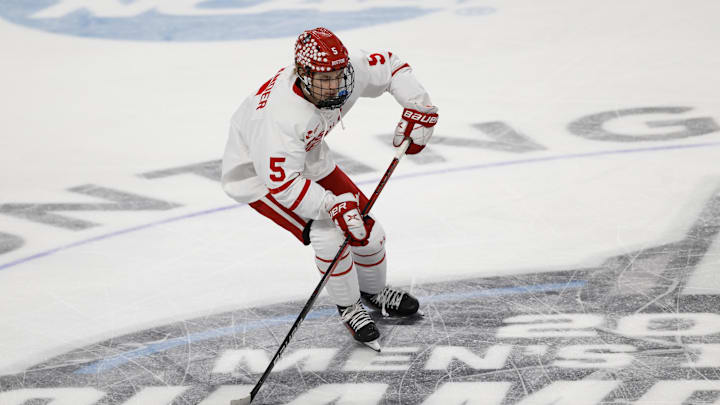 Mar 29, 2025; Toledo, OH, USA; Boston University defenseman Tom Willander (5) skates with the puck in the first period against the Cornell at Huntington Center. Mandatory Credit: Rick Osentoski-Imagn Images Mar 29, 2025; Toledo, OH, USA; Boston University defenseman Tom Willander (5) skates with the puck in the first period against the Cornell at Huntington Center. Mandatory Credit: Rick Osentoski-Imagn Images