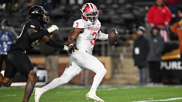 Nov 28, 2025; West Lafayette, Indiana, USA; Indiana Hoosiers wide receiver Omar Cooper Jr. (3) scores a touchdown during the third quarter against the Purdue Boilermakers at Ross-Ade Stadium. Mandatory Credit: Marc Lebryk-Imagn Images