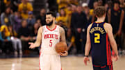 Apr 28, 2025; San Francisco, California, USA; Houston Rockets guard Fred VanVleet (5) questions the call after a play against Golden State Warriors guard Brandin Podziemski (2) during the fourth quarter of game four of the 2025 NBA Playoffs first round at Chase Center. Mandatory Credit: Kelley L Cox-Imagn Images