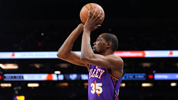 Mar 2, 2025; Phoenix, Arizona, USA; Phoenix Suns forward Kevin Durant (35) shoots against the Minnesota Timberwolves during the second half at Footprint Center. Mandatory Credit: Joe Camporeale-Imagn Images