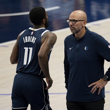 Dallas Mavericks guard Irving and head coach Kidd during the game between the Dallas Mavericks and the Minnesota Timberwolves in game four of the western conference finals for the 2024 NBA playoffs at American Airlines Center.