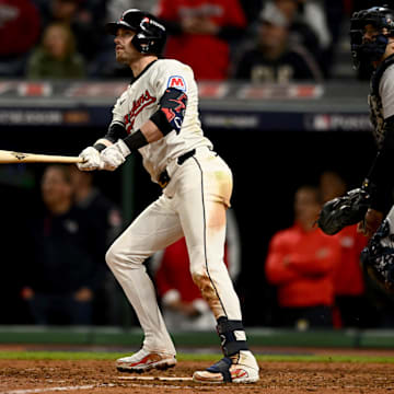 Oct 17, 2024; Cleveland, Ohio, USA; Cleveland Guardians outfielder Lane Thomas (8) doubles during the ninth inning against the New York Yankees in game 3 of the American League Championship Series at Progressive Field. Mandatory Credit: Ken Blaze-Imagn Images