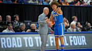 Mar 22, 2025; Lexington, KY, USA; UCLA Bruins head coach Mick Cronin talks with guard Trent Perry (1) during the first half against the Tennessee Volunteers in the second round of the NCAA Tournament at Rupp Arena. Mandatory Credit: Aaron Doster-Imagn Images