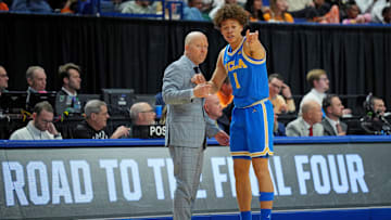 UCLA Bruins head coach Mick Cronin talks with guard Trent Perry  Mandatory Credit: Aaron Doster-Imagn Images