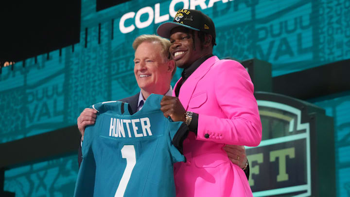 NFL commissioner Roger Goodell stands with Colorado Buffaloes wide receiver Travis Hunter after he is selected by the Jacksonville Jaguars as the number two pick in the first round of the 2025 NFL Draft.