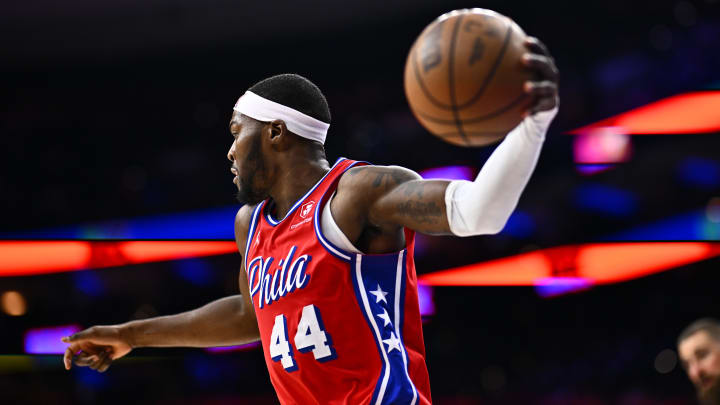 Mar 8, 2024; Philadelphia, Pennsylvania, USA; Philadelphia 76ers forward Paul Reed (44) secures a rebound against the New Orleans Pelicans in the fourth quarter at Wells Fargo Center.