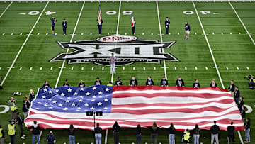 Dec 7, 2024; Arlington, TX, USA; A view of the Big 12 logo and American flag before the game between the Iowa State Cyclones and the Arizona State Sun Devils at AT&T Stadium. Mandatory Credit: Jerome Miron-Imagn Images