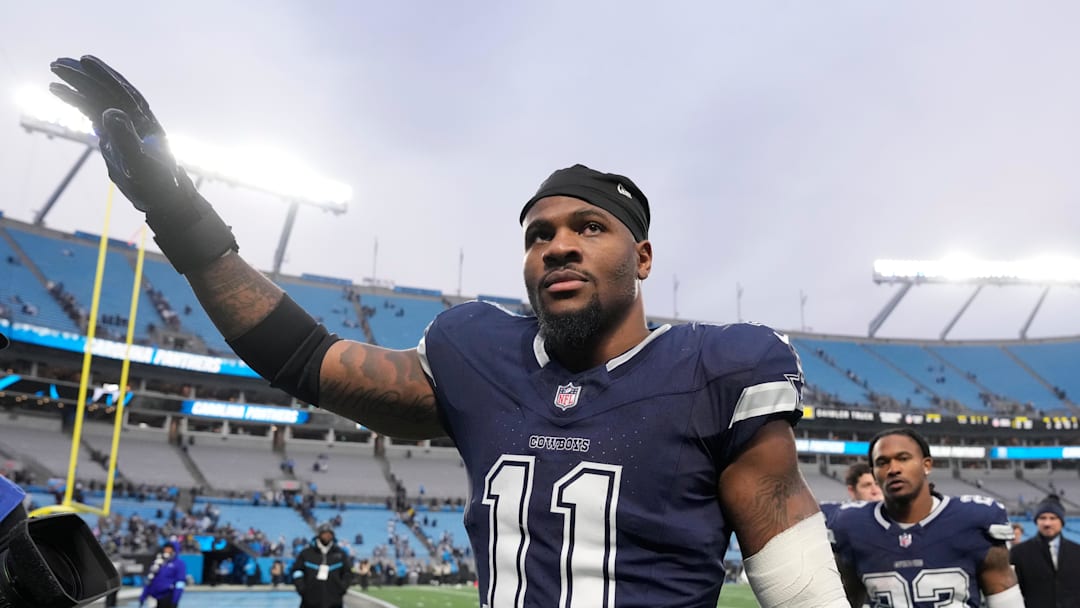 Dec 15, 2024; Charlotte, North Carolina, USA; Dallas Cowboys linebacker Micah Parsons (11) walks off the field after the game at Bank of America Stadium. Mandatory Credit: Bob Donnan-Imagn Images