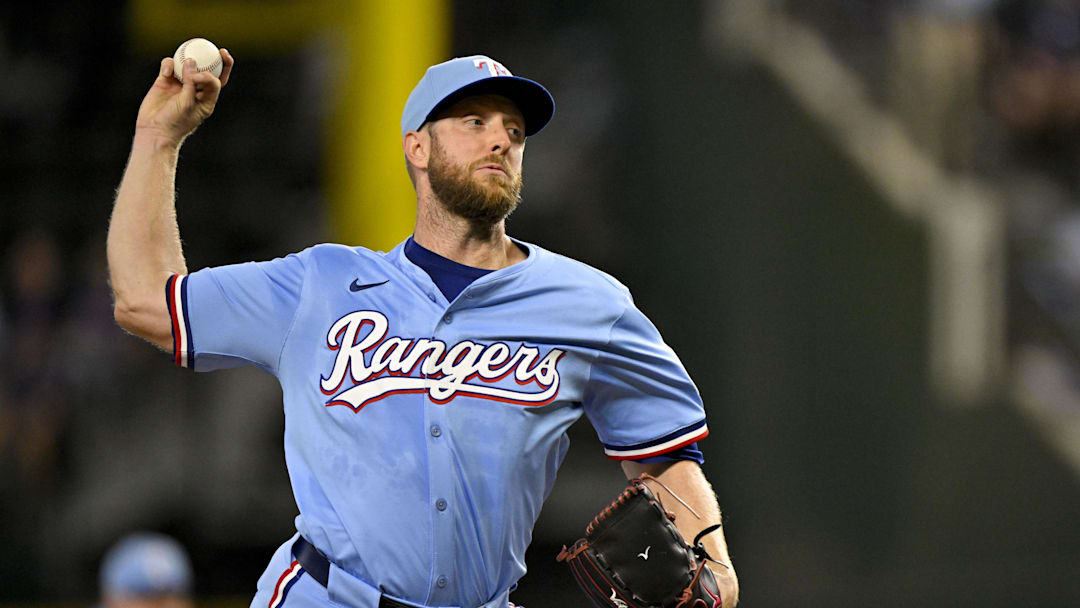 Sep 21, 2025; Arlington, Texas, USA; Texas Rangers starting pitcher Merrill Kelly (23) throws the ball during the first inning against the Miami Marlins at Globe Life Field. Mandatory Credit: Jerome Miron-Imagn Images