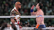 Apr 7, 2024; Philadelphia, PA, USA; The Rock and John Cena interfere during the WWE Universal Championship match between Roman Reigns and Cody Rhodes during Wrestlemania XL Sunday at Lincoln Financial Field. Mandatory Credit: Joe Camporeale-Imagn Images