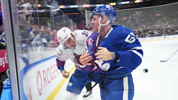 Nov 11, 2023; Toronto, Ontario, CAN; Toronto Maple Leafs defenseman Mark Giordano (55) fights with
