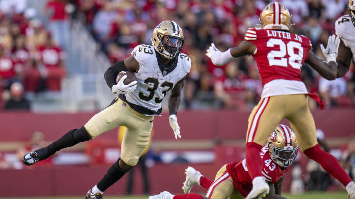 New Orleans Saints running back Jordan Mims (33) runs the football against the San Francisco 49ers 