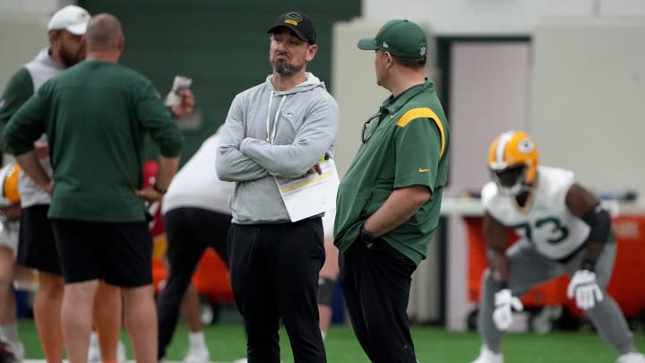 Green Bay Packers head coach Matt LaFleur, left, talks with general manager Brian Gutekunst during organized team activities Tuesday, May 23, 2023 in Green Bay, Wis.