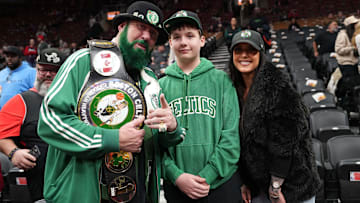 Boston Celtics fans show their support before a game against the Toronto Raptors at the Scotiabank Arena.