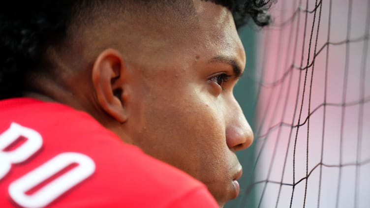 Cincinnati Reds shortstop Jose Barrero (2) looks out of the dugout