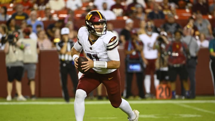 Washington Commanders quarterback Jake Fromm (11).