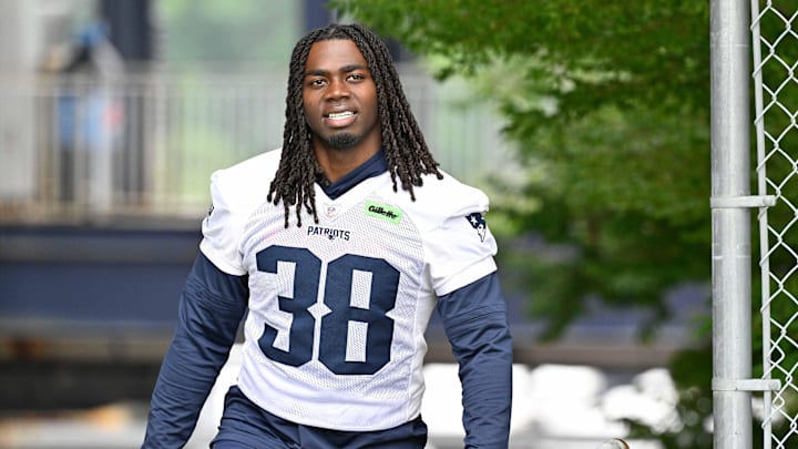 Jun 9, 2025; Foxborough, MA, USA; New England Patriots running back Rhamondre Stevenson (38) walks to the practice fields at Gillette Stadium. Mandatory Credit: Eric Canha-Imagn Images